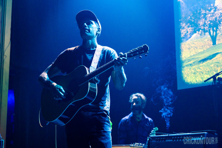 The indie rock band Grandaddy performs on a dimly lit stage at the Neptune Theater.