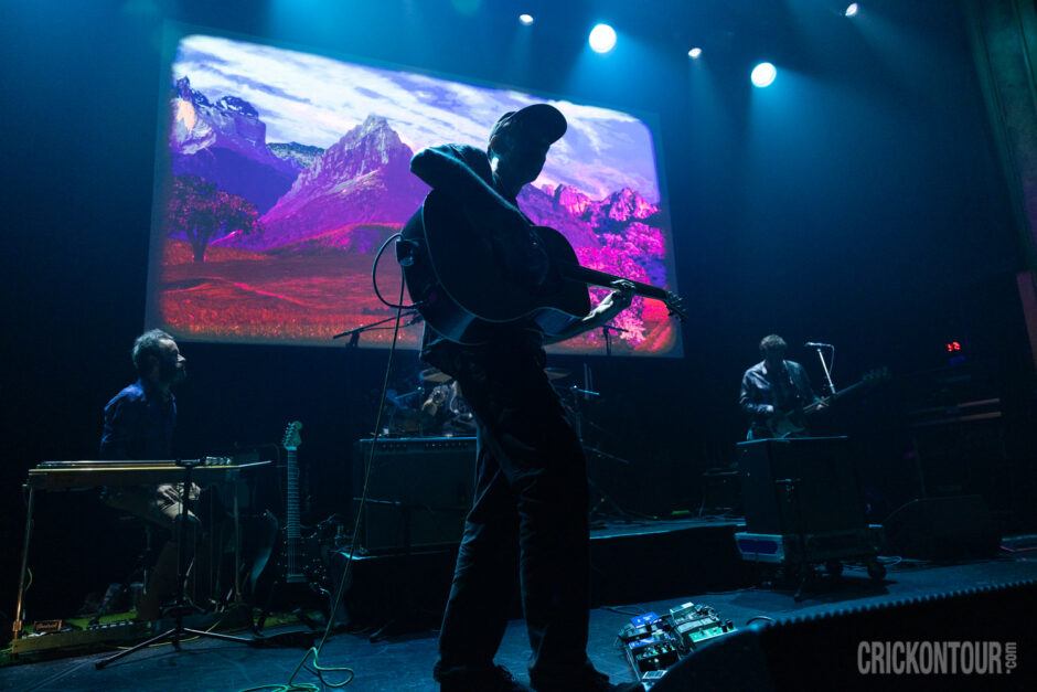 The indie rock band Grandaddy performs on a dimly lit stage at the Neptune Theater.