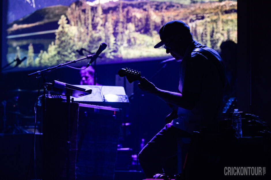 The indie rock band Grandaddy performs on a dimly lit stage at the Neptune Theater.