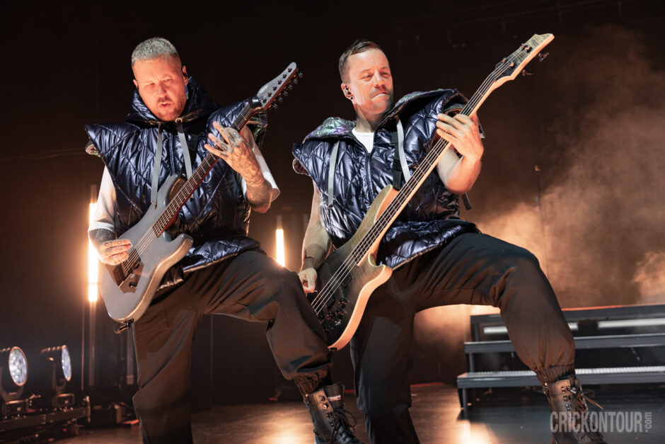 A high-energy image of the German electronicore band Electric Callboy performing at The Paramount Theatre.